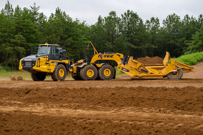 Komatsu Menyetujui K-Tec 1237 Scraper untuk Truk Dump Articulated HM460-6